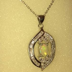 Sterling silver opal pendant.